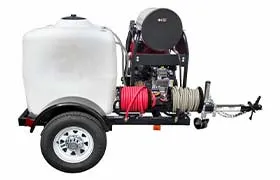 Side view of a hot water pressure washer trailer with a large white tank and coiled hoses.