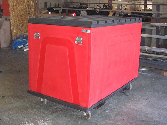 Red rotationally molded refuse container